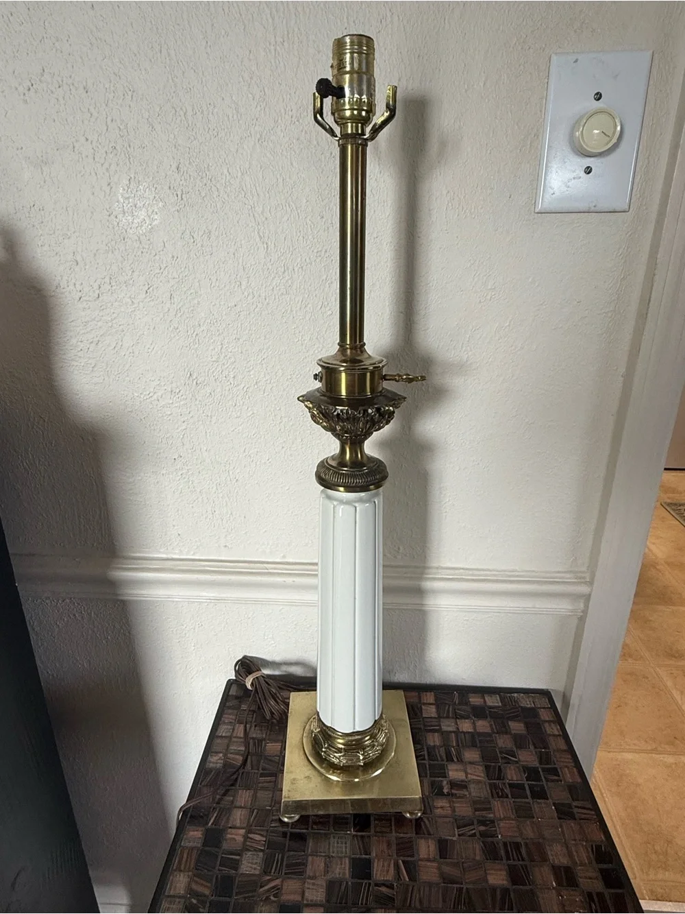vintage Stiffel Hollywood Regency table lamp featuring a white porcelain column